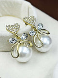 TVI Korean Studded Bow Heart Big Pearl Drop Earrings.